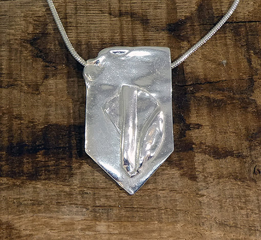 Textile-themed pendant